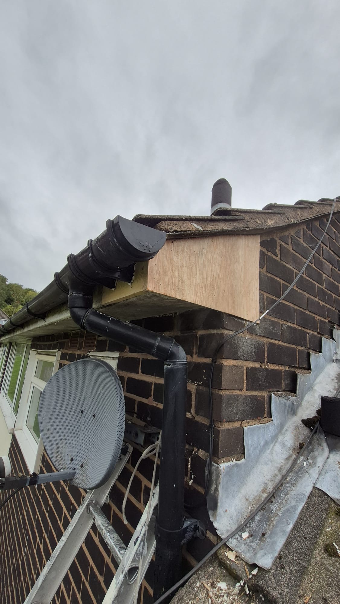 New timber section fitted at roofline level at Sutton Court