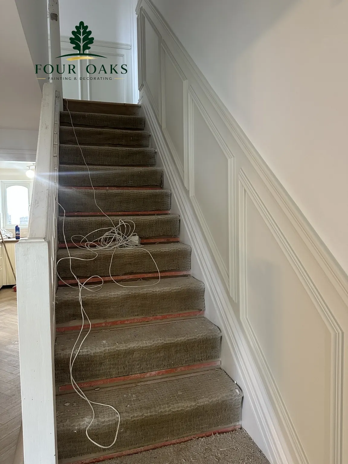 Four Oaks staircase before redecoration — worn timber and old paintwork
